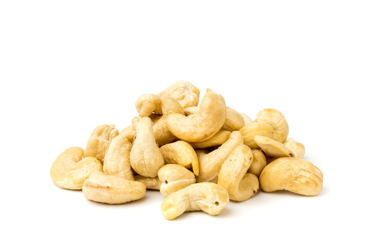 Heap of cashews on a white