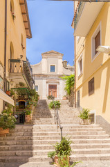 Fototapeta na wymiar Taormina, Sicily, Italy. A colorful street in the historical center