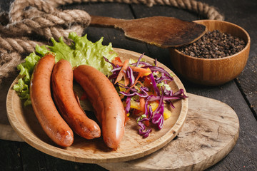 Grilled sausages and vegetables