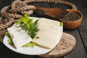 White cheese on white plate