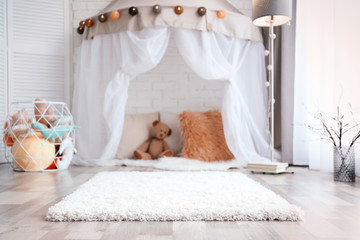 Soft fluffy carpet in child room