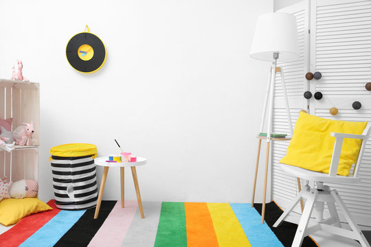 Child's room with drawing accessories on table