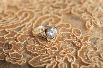 Beautiful engagement ring on lace