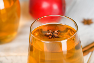 Glass of delicious apple juice, closeup