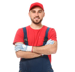 Handsome auto mechanic on white background