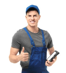Handsome auto mechanic with tablet computer on white background