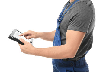 Auto mechanic with tablet computer on white background, closeup