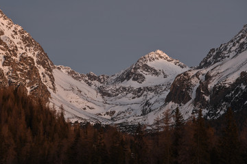 scenery of snow covered High Tatras mountains in the night in Slovakia