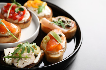 Tasty fresh bruschettas on plate