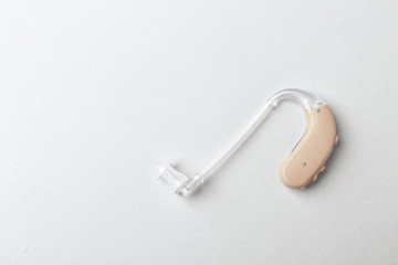 Hearing aid on light background