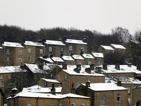terraced houses covered in snow in hebden bridge west yorkshire