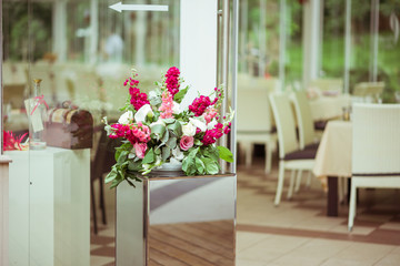 Pink wedding decor and wedding luxury, party designs. Flowers details for the wedding ceremony