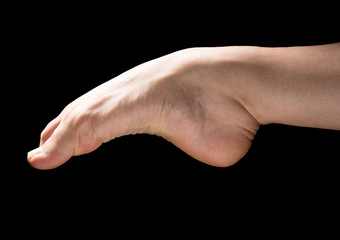 Barefoot of ballerina, isolated on black background