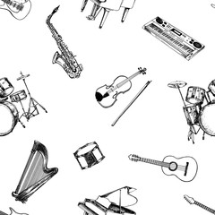 Seamless pattern of hand drawn sketch style musical instruments. Vector illustration isolated on white background.