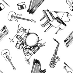 Seamless pattern of hand drawn sketch style musical instruments. Vector illustration isolated on white background.