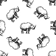 Seamless pattern of hand drawn sketch style rhino. Vector illustration isolated on white background. © Ecaterina Sciuchina