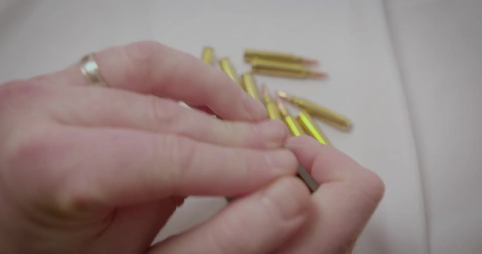 Loading a gun magazine