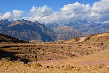 Fototapeta na wymiar The archaeological ruins of Moray sit on a high plateau in the Andes and features circular agricultural terraces believed to have been used by the Incas to test climate on crop growth..