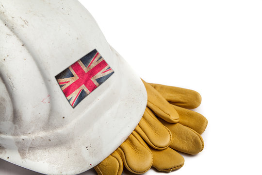 Construction Workers Hard Hat and Gloves showing badge of the  flag of Great Britain