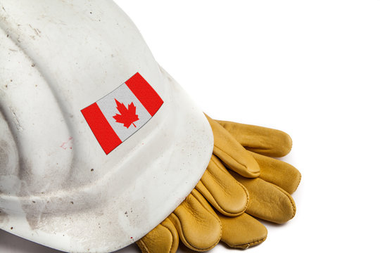 Construction Workers Hard Hat and Gloves showing badge of the  flag of Canada