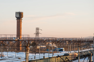 Obraz premium industrial landscape. railway station outdoors in winter