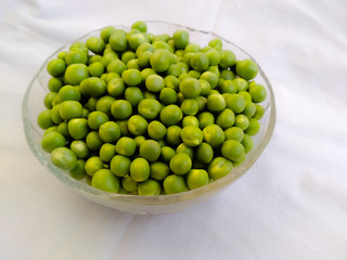 Fresh organic green pea in a bowl