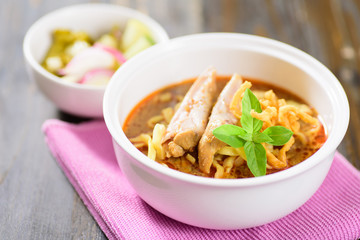 Northern Thai food (Khao soi), curry noodles soup with chicken