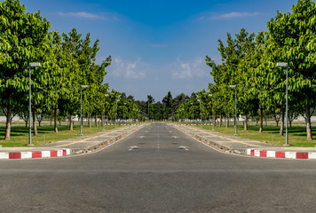 Road with red and white curb