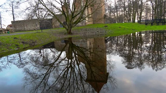 Old Castle Reflection in the Lake Mirror in the Park