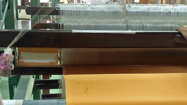 Slowmotion : Traditional Thai textile manufacture in craft village,Mobile Shoot