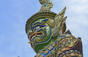 Fototapeta na wymiar Colorful, Demon Guardian statue at Grand Palace, Bangkok Thailand
