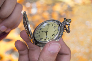 Picture of the old pocket watch in hand.