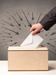 close up of a ballot box and casting vote