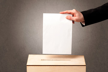 Ballot box with person casting vote
