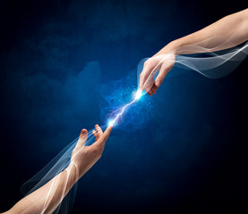 Hands connecting through fingers in space
