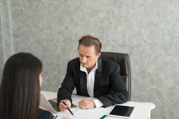Boss complain to businesswoman employee for mistake on her job,  team leader dissatisfie with...