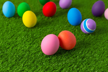 Fototapeta na wymiar Easter eggs on the grass