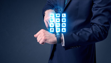 Businessman wearing smartwatch.