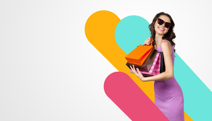 Caucasian happy young woman with shopping bags