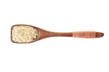 spice Fenugreek powder in  wooden spoon isolated on a white background, top view