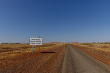 Outback Road with Overtaking Sign