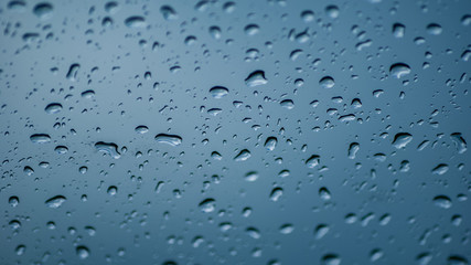 Dropes of water on car window
