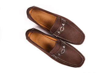 Men's brown suede moccasins, loafers isolated white background.