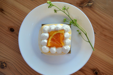 Homemade Orange fresh cream Cake with Orange topping and fresh cream