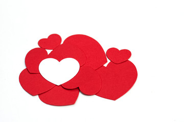 Valentine's day cut red paper heart with white background.