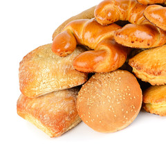 Cereal bread, croissants and sweet pastries isolated on white background.