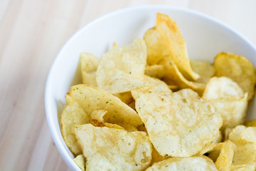 Simple potato chips on white background