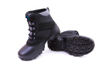 Black winter shoes. 
Pair of black winter shoes isolated on white background