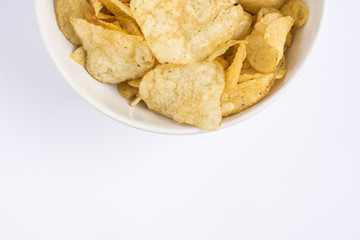 Simple potato chips on white background