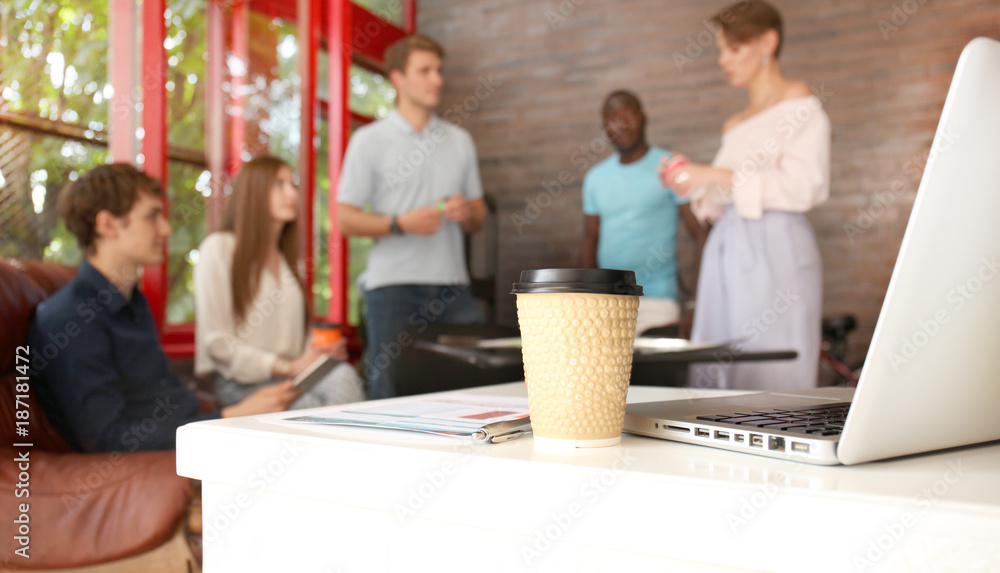 Sticker Team young professionals having casual discussion in office. Executives having friendly discussion during break.